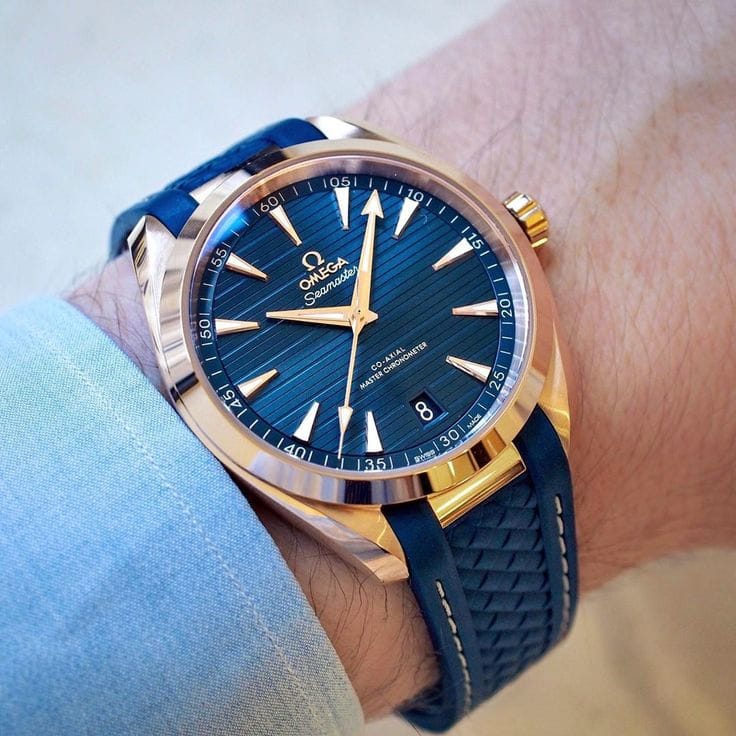Luxury Automatic Chronometer: Rose Gold Tone Case, Deep Blue Teak Dial, and Rubber Strap